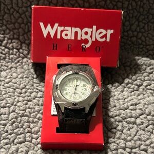 Wrangler Hero men's wristwatch 32606-1. 
Stainless steel case/ two-piece strap